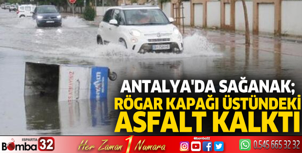 Antalya'da sağanak; rögar kapağı üstündeki asfalt kalktı