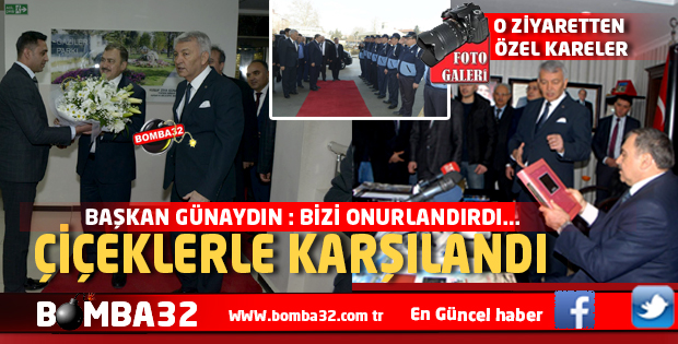 BAKAN EROĞLU ÇİÇEKLERLE KARŞILANDI 