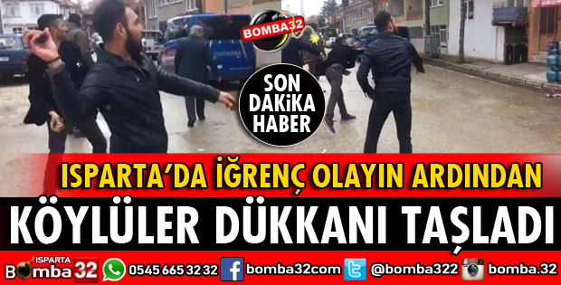 BAKKAL DÜKKANINI TAŞ YAĞMURUNA TUTTULAR
