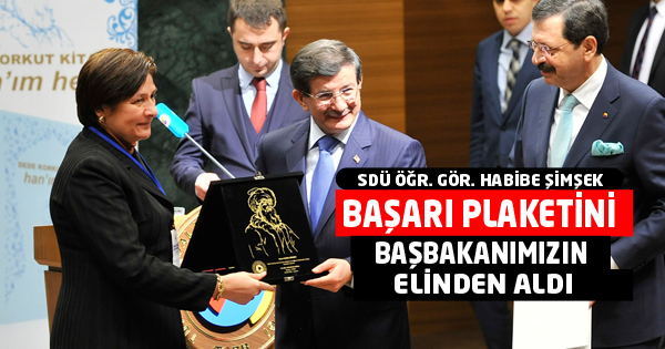 BAŞARI PLAKETİNİ BAŞBAKANIMIZIN ELİNDEN ALDI