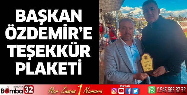 Başkan Özdemir’e plaket