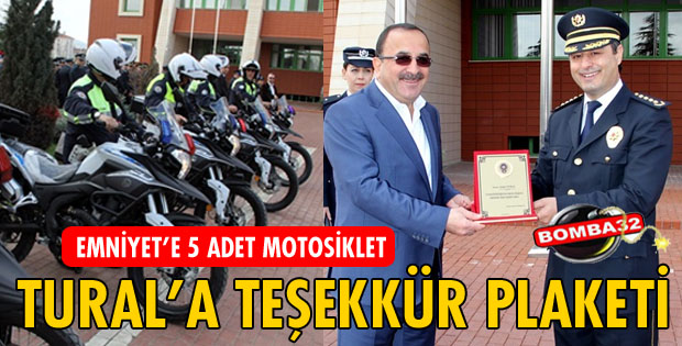 BAŞKAN TURAL'A PLAKET