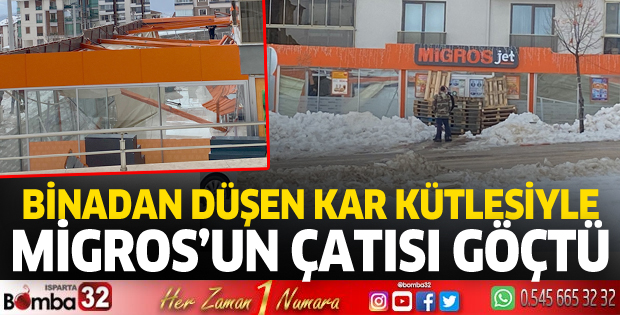 Binadan düşen kar kütlesiyle Migros'un çatısı göçtü