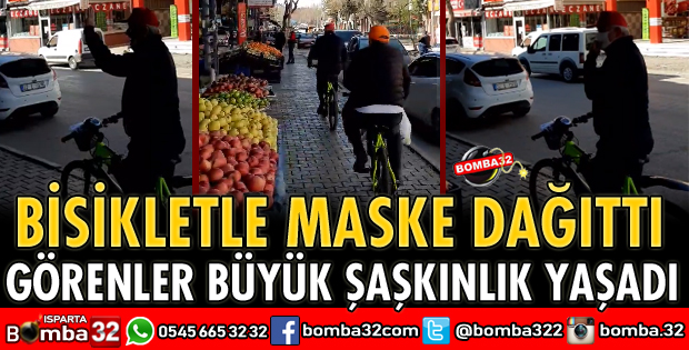 BİSİKLETLE MASKE DAĞITTI