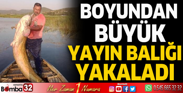 Boyundan büyük yayın balığı yakaladı