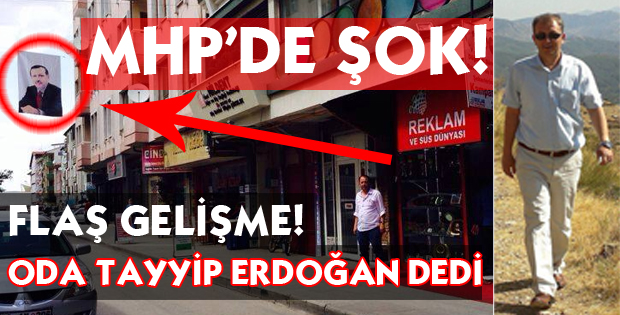 DÜKKANIN ÖNÜNE BAYRAK ASTI