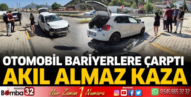 Eğirdir'de otomobil bariyerlere çarptı