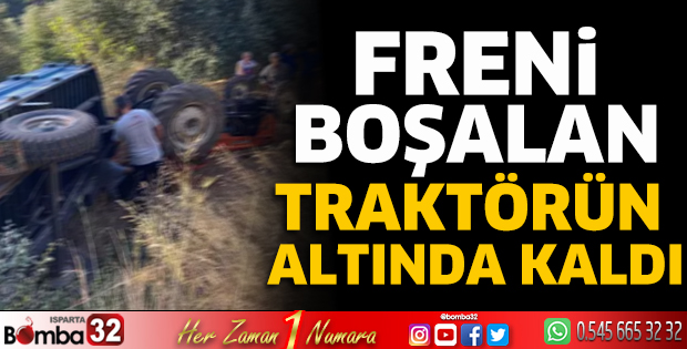 Freni boşalan traktörün altında kaldı 