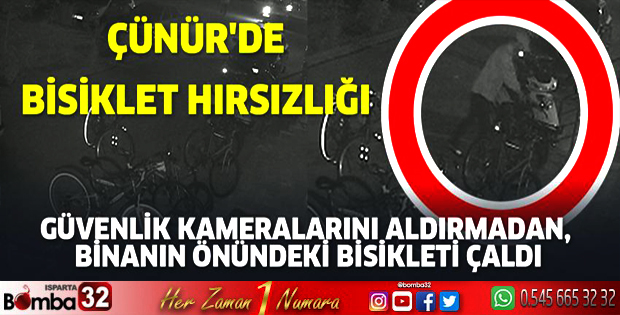 GÜVENLİK KAMERALARINI ALDIRMADAN, BİNANIN ÖNÜNDEKİ BİSİKLETİ ÇALDI