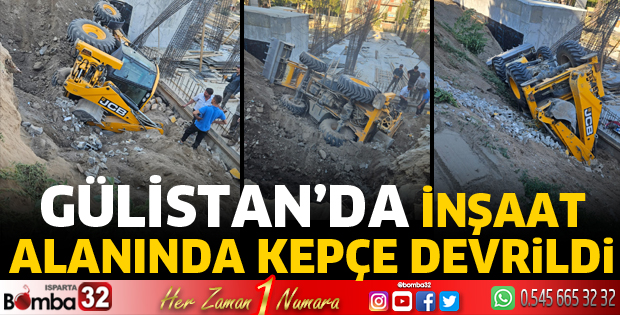 İnşaat alanında kepçe devrildi