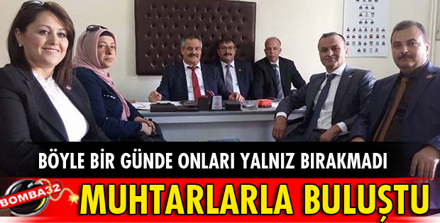İŞ ADAMI UÇMAN MUHTARLARLA BULUŞTU