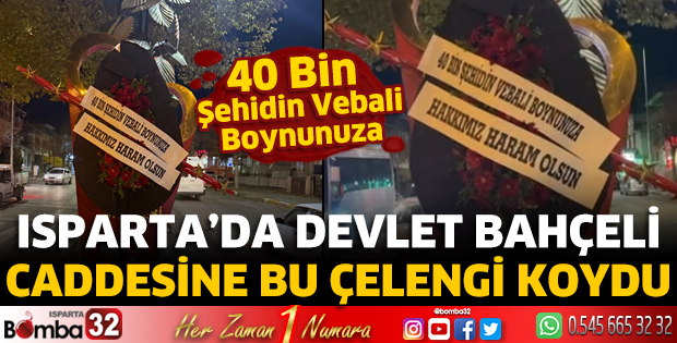Isparta’da Devlet Bahçeli Caddesine bu çelengi koydu