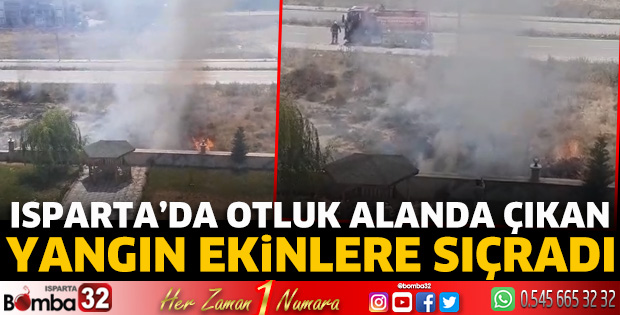 Isparta’da otluk alanda çıkan yangın ekinlere sıçradı.