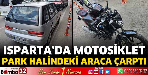 Isparta'da motosiklet park halindeki araca çarptı