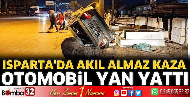 Isparta'da otomobil yan yattı