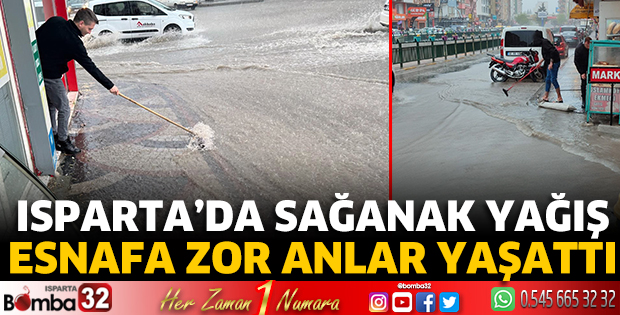 Isparta'da sağanak yağış esnafa zor anlar yaşattı 
