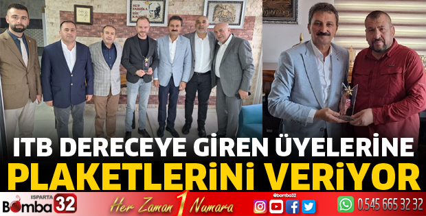 ITB dereceye giren üyelerine plaketlerini veriyor