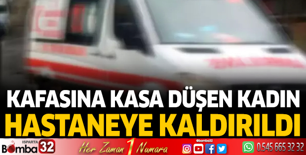 Kafasına kasa düşen kadın yaralandı