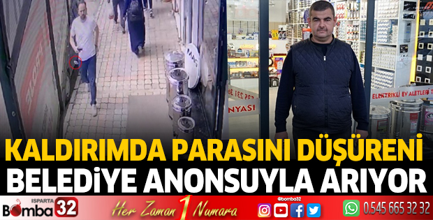 Kaldırımda parasını düşüreni arıyor