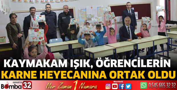 Kaymakam Işık, öğrencilerin karne heyecanına ortak oldu