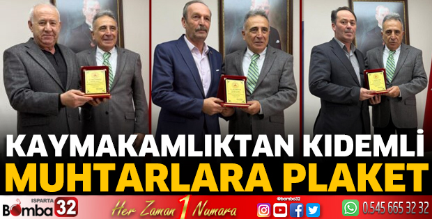 Kaymakamlıktan kıdemli muhtarlara plaket