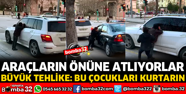 KIRMIZI IŞIKLARDA ARAÇLARIN ÖNÜNE ATLIYORLAR