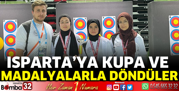Kupa ve madalyalarla döndüler