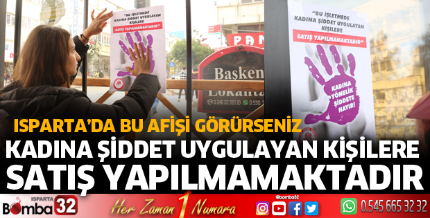 Öğrenciler cama astığı afişle kadına şiddete karşı farkındalık oluşturdu