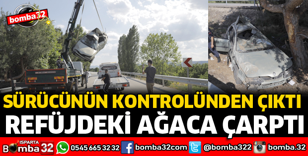 OTOMOBİL AĞACA ÇARPARAK DURABİLDİ
