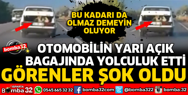 OTOMOBİLİN YARI AÇIK BAGAJINDA YOLCULUK YAPTI