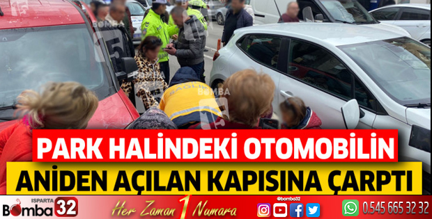 Park halindeki otomobilin aniden açılan kapısına çarptı