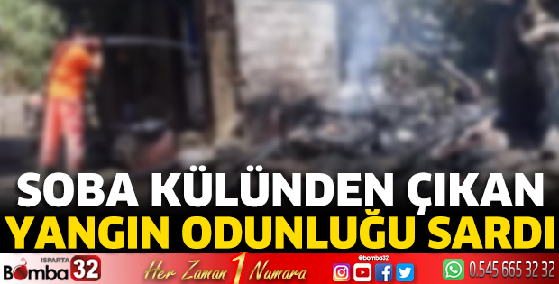 Soba külünden çıkan yangın odunluğu sardı 