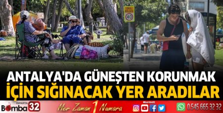Antalya'da güneşten korunmak için sığınacak yer aradılar