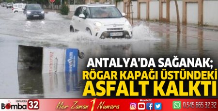 Antalya'da sağanak; rögar kapağı üstündeki asfalt kalktı