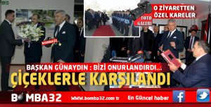 BAKAN EROĞLU ÇİÇEKLERLE KARŞILANDI 