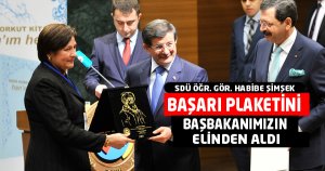 BAŞARI PLAKETİNİ BAŞBAKANIMIZIN ELİNDEN ALDI