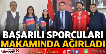 Başarılı sporcuları makamında ağırladı