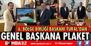 BAŞKAN TURAL'DAN GENEL BAŞKANA PLAKET