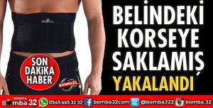 BELİNDEKİ KORSEYE SAKLAMIŞ 
