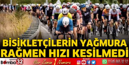 Bisikletçilerin yağmura rağmen hızı kesilmedi