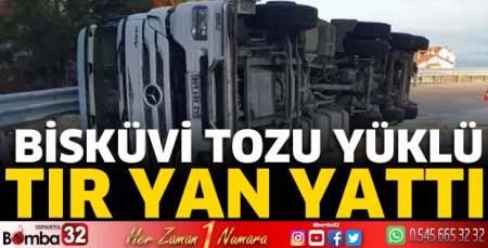 Bisküvi tozu yüklü tır yan yattı
