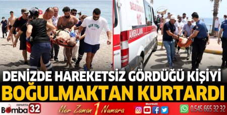 Denizde hareketsiz gördüğü kişiyi boğulmaktan kurtardı
