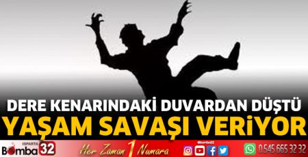 Dere kenarındaki duvardan düştü