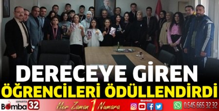 Dereceye giren öğrencileri ödüllendirdi