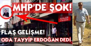 DÜKKANIN ÖNÜNE BAYRAK ASTI
