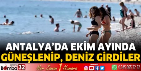 Ekim ayında güneşlenip, deniz girdiler