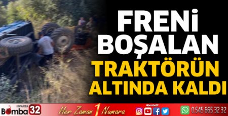 Freni boşalan traktörün altında kaldı 