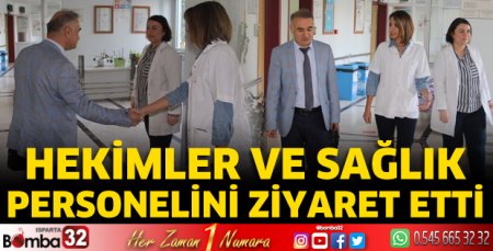 Hekimler ve sağlık personelini ziyaret etti
