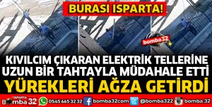 İNŞAAT İŞÇİSİNDEN KOPAN ELEKTRİK TELİNE TAHTAYLA MÜDAHALE