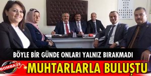 İŞ ADAMI UÇMAN MUHTARLARLA BULUŞTU